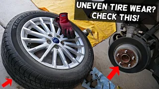 FORD UNEVEN TIRE WEAR REAR TIRES, GOOD ALLIGNMENT