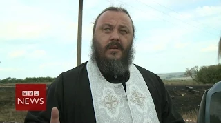 MH17: 'We're not terrorists' says local priest in eastern Ukraine - BBC News