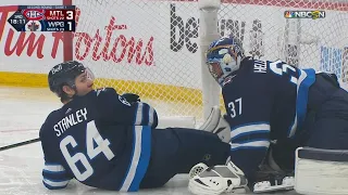 Logan Stanley Crashes Into Connor Hellebuyck