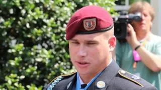 Former Army Sgt. Kyle White talks to press after his Medal of Honor ceremony