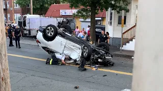 Mass. teacher rescued from flipped SUV after crash with stolen vehicle
