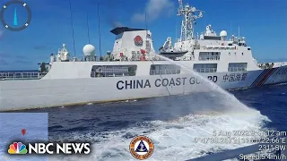 China water-cannons Philippine military ship in the South China Sea