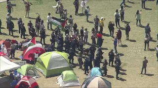 Police in riot gear blocks Denver students from returning to their encampment at Auraria campus