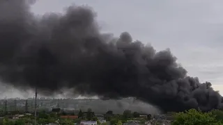 Plume of dark smoke marks site of Russian airstrike in Kharkiv