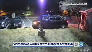 Video shows woman try to run over her boyfriend