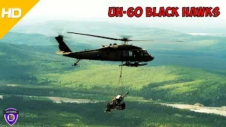 UH-60 Black Hawks Sling Load a Vehicle and Two Howitzer Artillery Guns