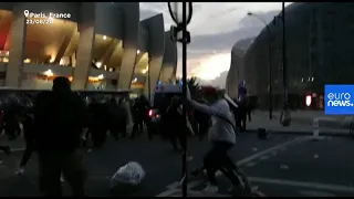 Paris fans clash with riot police after PSG lose Champions League final