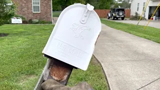 Using The More Power Puller to pull up our old mailbox
