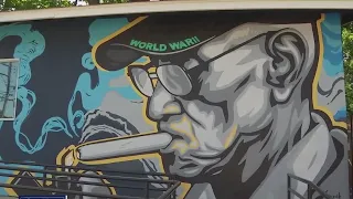 ‘The Cigar Vault’ opening with giant Richard Overton mural on the side