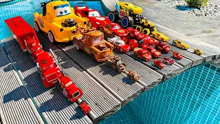 Disney Pixar Cars falling into deep pool, Lightning McQueen, Tow Mater, Mack, Sally, Francesco