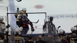 Carson Meyer throws a hit on Charlie McAvoy on his NHL debut