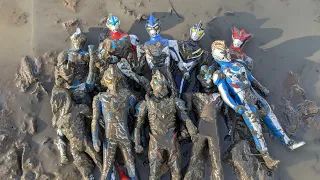 mencari mainan ultraman zero dan ultraman ginga di lumpur