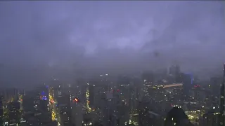 Heavy storms move through Chicago, obscuring buildings