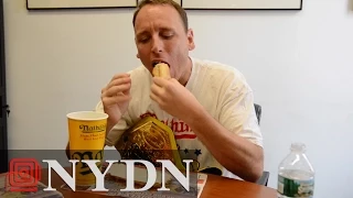 Major League Eating champion Joey Chestnut Eats a Hot Dog in Slow-mo