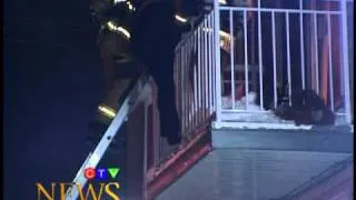 Woman rescued from burning building