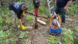 Driving a sandpoint well with a jackhammer