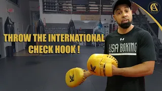 How To | Throw the international check hook !