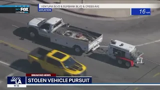 LAPD in pursuit of suspected stolen vehicle in the San Fernando Valley