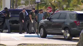 Man accused of robbing bank with machete chased down in Miami-Dade