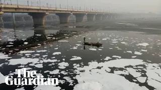 Drone footage shows toxic foam floating on the Yamuna River in Delhi