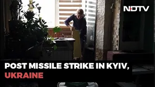 After Russian Bombing, Ukrainian Woman Cleans Shattered Glass From House