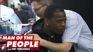 Cutting hair at West Side Chicago barber shop