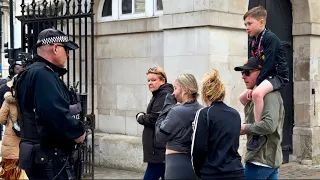 POLICE Officer Immediately rushed & tells keeps Quiet! As they SCREAM very loud at horse GUARDS