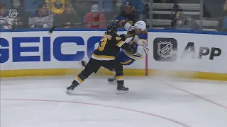 Brad Marchand Throws A Huge Hit On Rasmus Dahlin