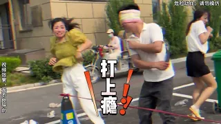 Screaming Chicken Blindfolded and Beating Man and woman  Challenge Shiatsu Board Here Comes