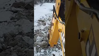 -25 C ° работает JCB с клыком рыхлитель