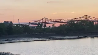 Tug and barge head under McArdle Bridge from Chelsea Creek