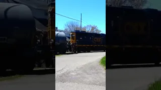 Car Drives In Front of Train Over Railroad Crossing