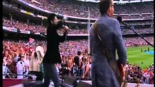 INXS perform live at the 2010 AFL Grand Final