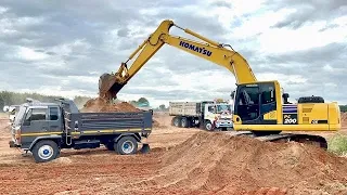 Amazing excavators are helping to clean up the area in preparation for a new project dig a gas well