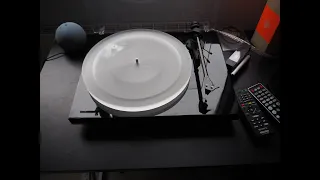 Pro-Ject Debut Carbon DC Turntable with Acryl It Platter, 2M Black Stylus  on 2M Red Cart Review