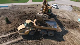 DRONE VIEW of Excavator Loading Dump Truck //Cat 740 Off Road Dump Round Trip-Residential Excavating