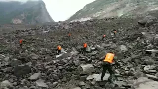 China: Over 100 people feared buried in landslide