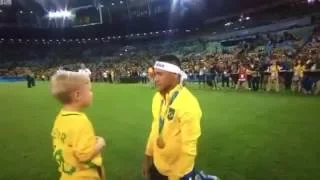 Neymar celebrating with his son Davi Lucca after winning the Final vs  Germany.