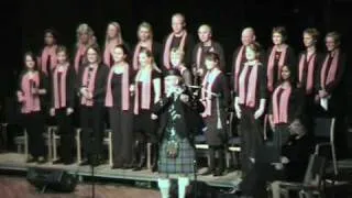 Bagpipe playing Amazing Grace with a gospel choir