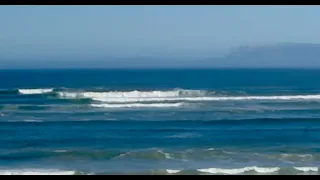 Massive swell lights up mystery Strand reef in Cape Town. Captured on live stream webcam today