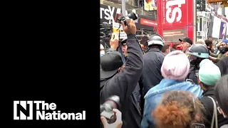 Trump supporters and opponents clash in NYC