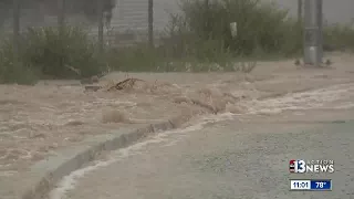 Rain, flooding, water rushing through streets in northwest Las Vegas