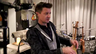 Jeremy Renner in his home studio