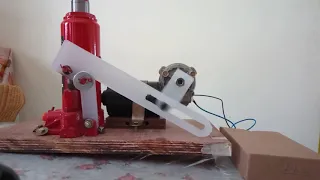 Manual hydraulic jack driven automatically by DC motor