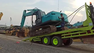 Cara menurunkan Excavator dari atas truk trado