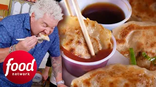 Guy Fieri Eats One Of The Biggest Dumplings He Has Ever Seen | Diners, Drive-Ins & Dives