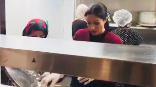 Meghan Cooks During LOW KEY Visit To Grenfell Hubb Community Kitchen!