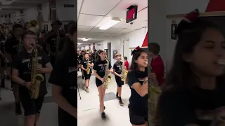 Metamora Grade School Marching Band marching through the halls