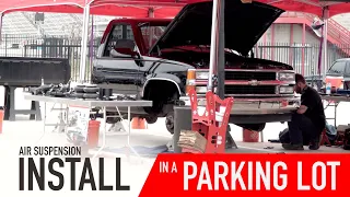 We Install Air Suspension System and C-Notches on a 1997 Chevy C1500 OBS Truck in a parking lot!