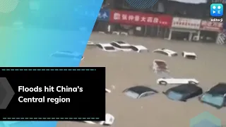 China floods: Thousands evacuated, train stations and roads inundated